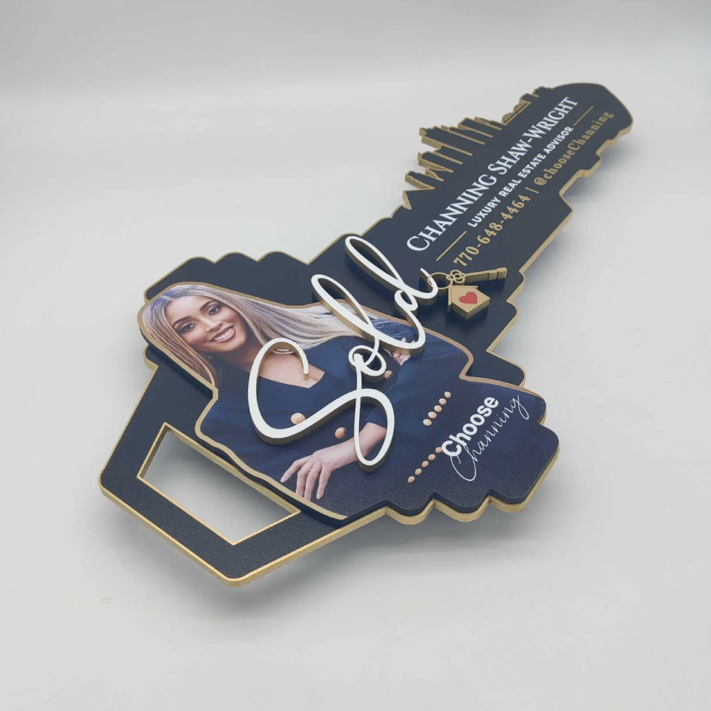 Black and Gold "Skyline" sign with photo