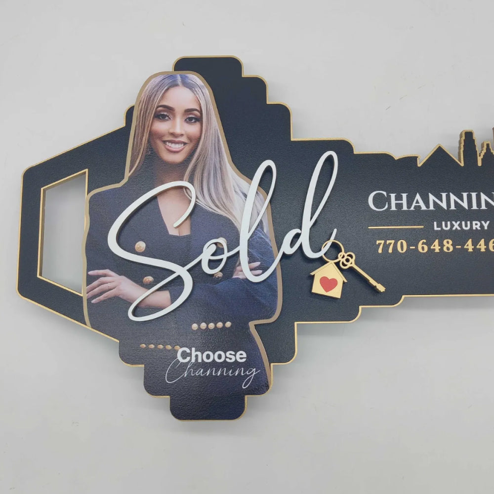 Black and Gold "Skyline" sign with photo