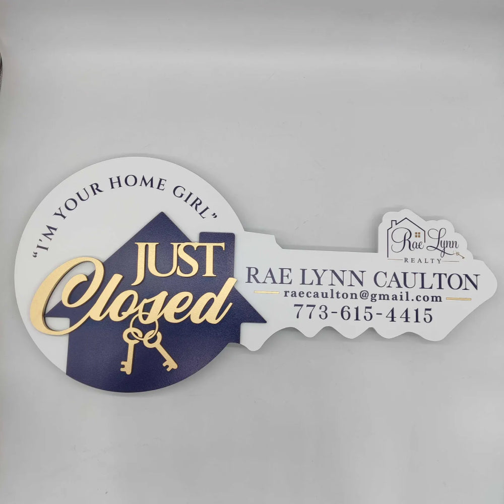 Sign with "Just Closed" gold and navy blue