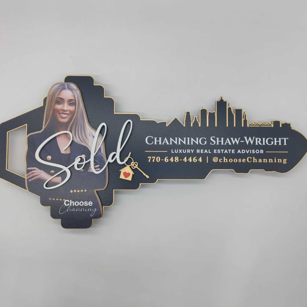 Black and Gold "Skyline" sign with photo