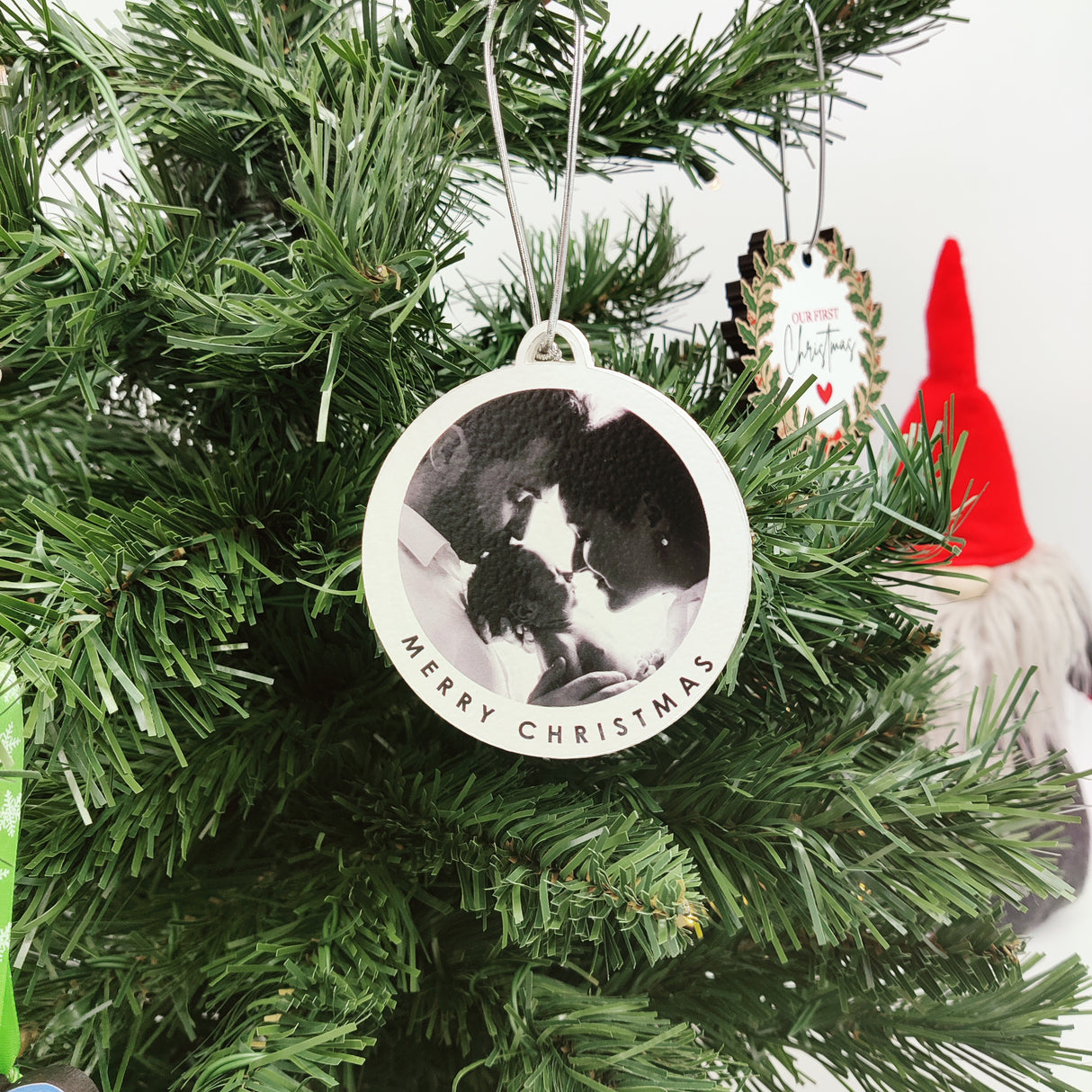 Christmas ornament that can be personalized with a company's name and logo