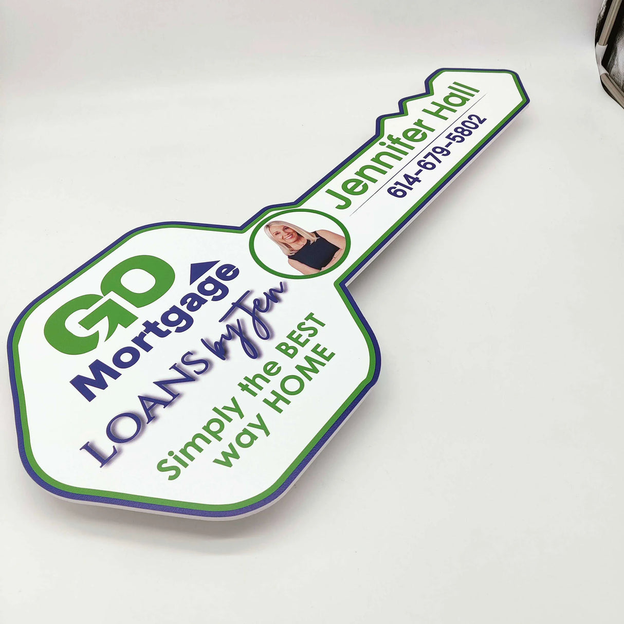 Key Shaped Sign White with Green&Blue Outline and Photo  "Simply the Best Way Home"