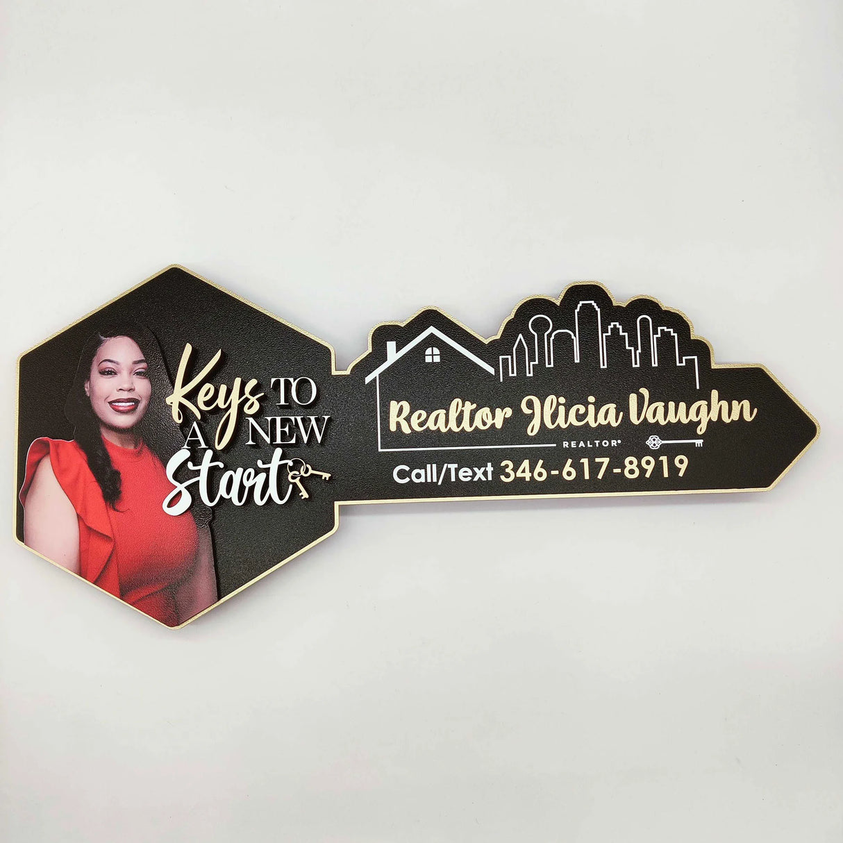 Black Key Shaped Sign with Gold Outline "Key to a New Start"