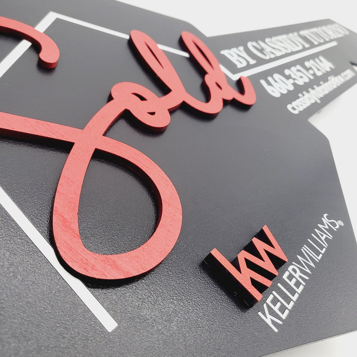 Hexagon Black Key Shaped with a House Line - Real Estate Store