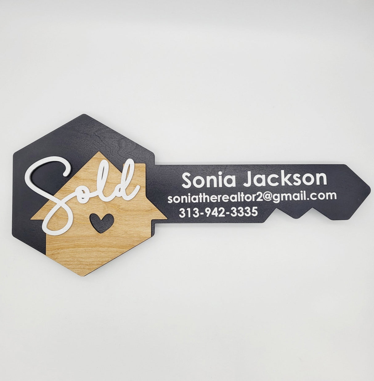 Hexagon Key with a Wooden House - Real Estate Store