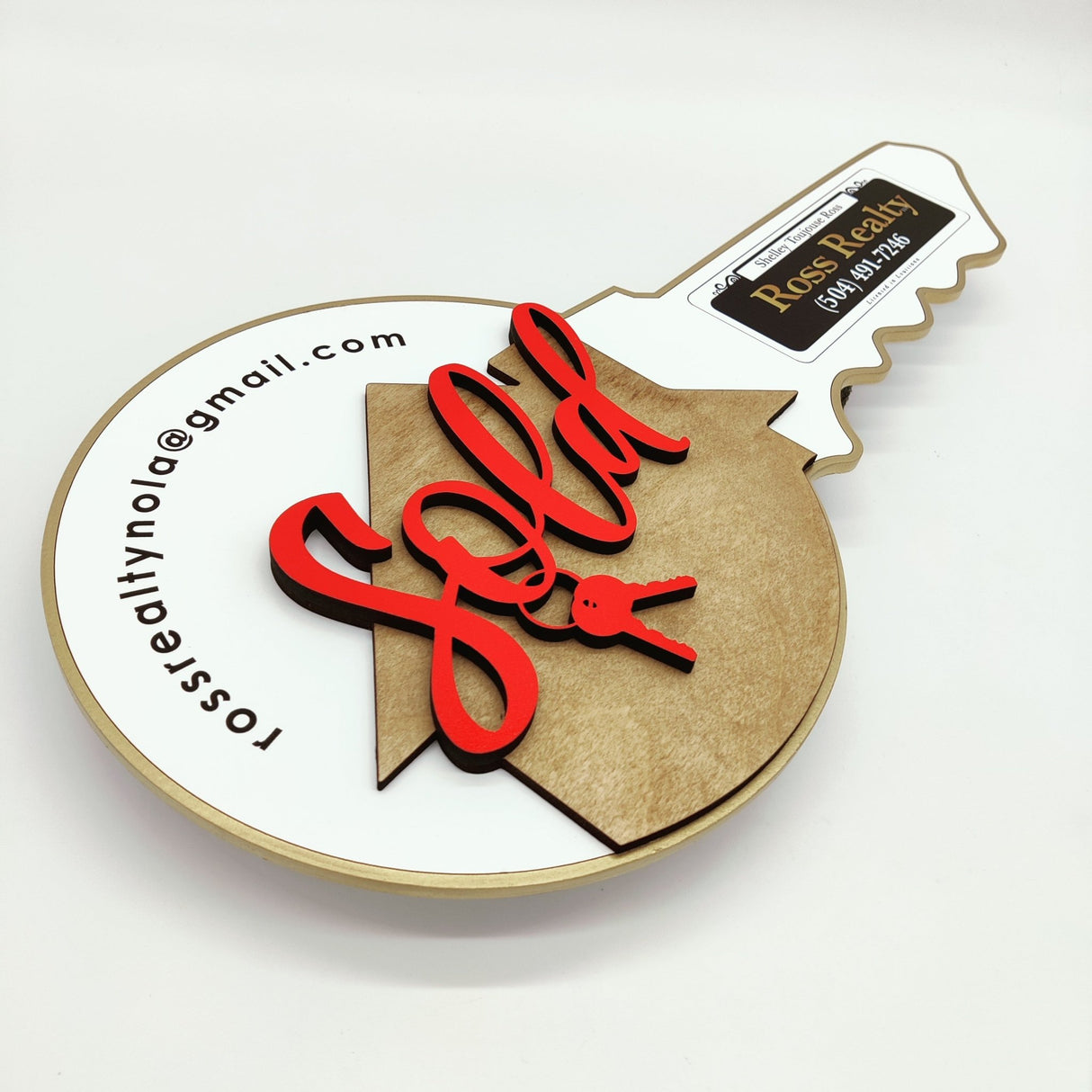 Key Shaped Real Estate Round with a Wooden House & Keys - Real Estate Store