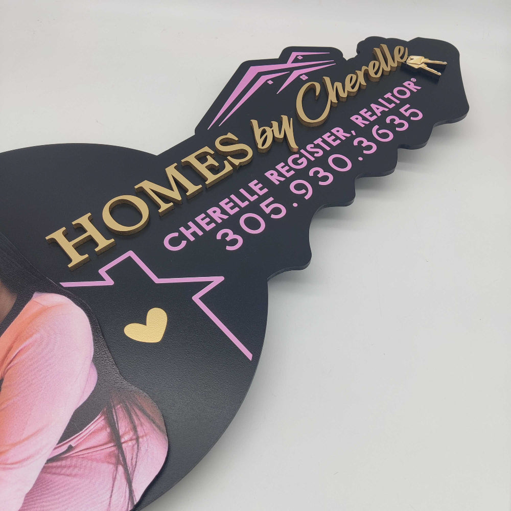 Homes by "your name" sign