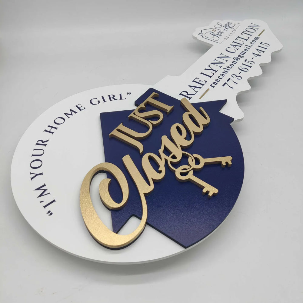 Sign with "Just Closed" gold and navy blue