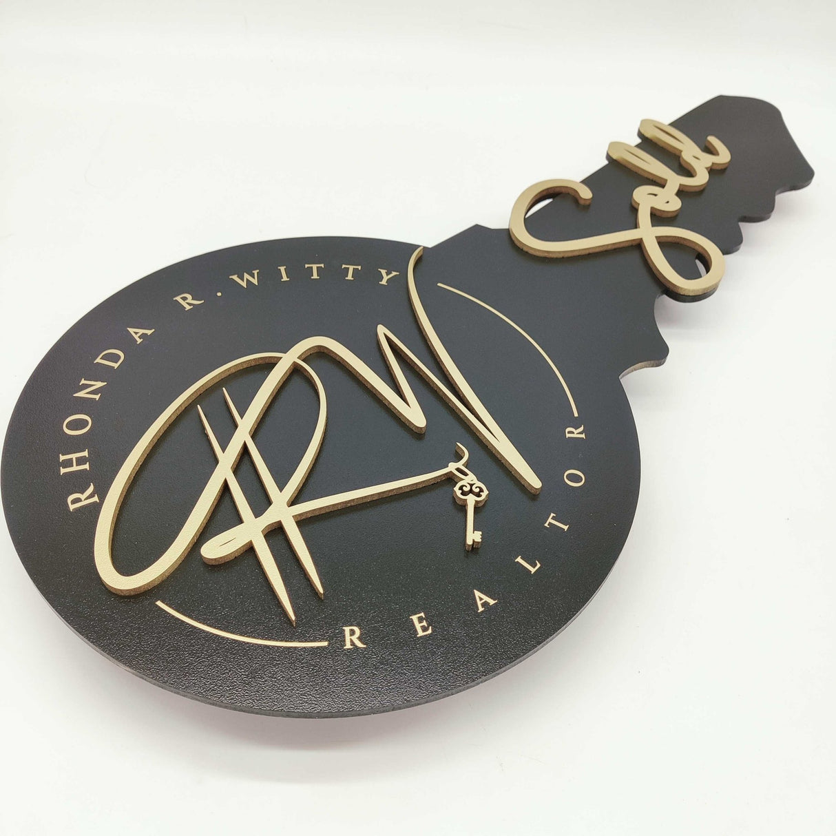 Round Shaped Key «Sold with Initials» - Real Estate Store