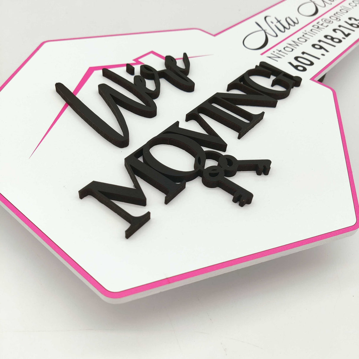 Round Shaped Key "We're moving" - Real Estate Store