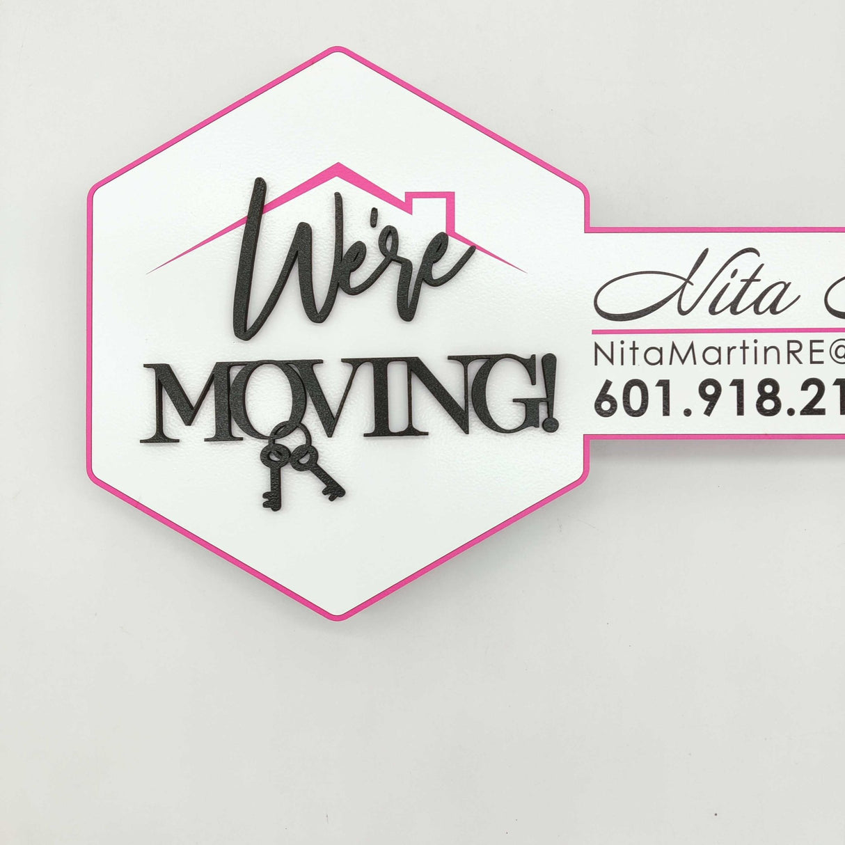 Round Shaped Key "We're moving" - Real Estate Store