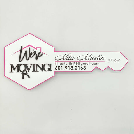 Round Shaped Key "We're moving" - Real Estate Store