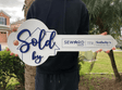 White Classic Key Shaped Prop «Sold By» with House Outline - Real Estate Store