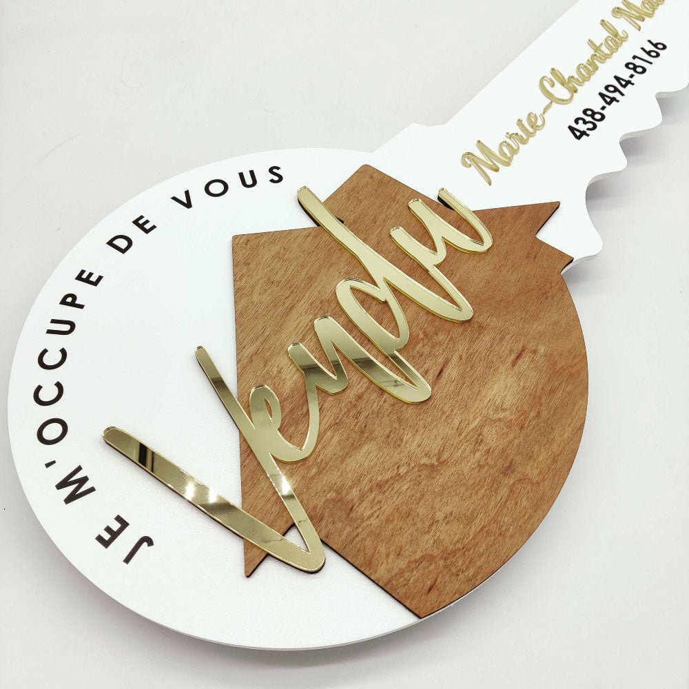 White Round Key Shaped "Vendu" - Real Estate Store