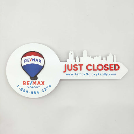 White Round Shaped Key «Remax» - Real Estate Store