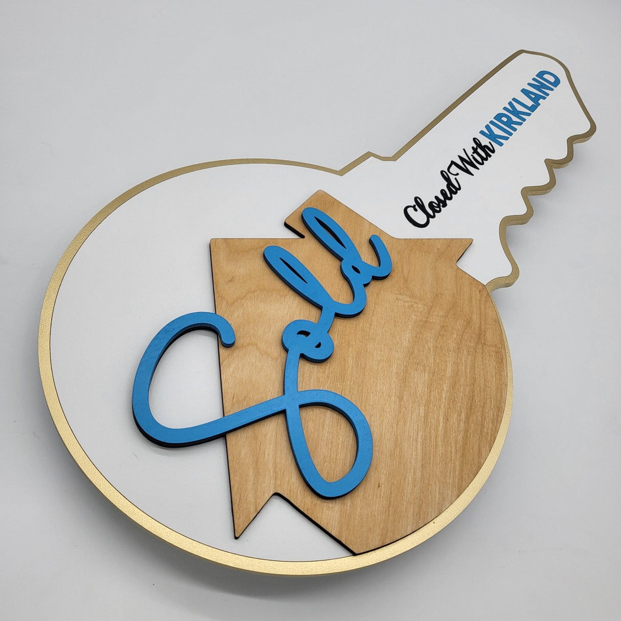 White Round Shaped Key Sign «Sold» - Real Estate Store