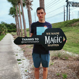 Black Key Shaped Sign White text "We Made Magic Happen"