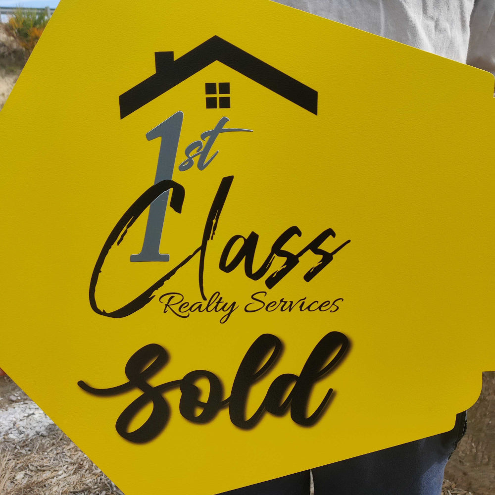 Yellow Sign For  1st Class Realty