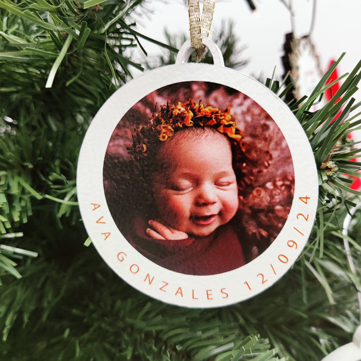 Round Christmas Ornament with a baby Face