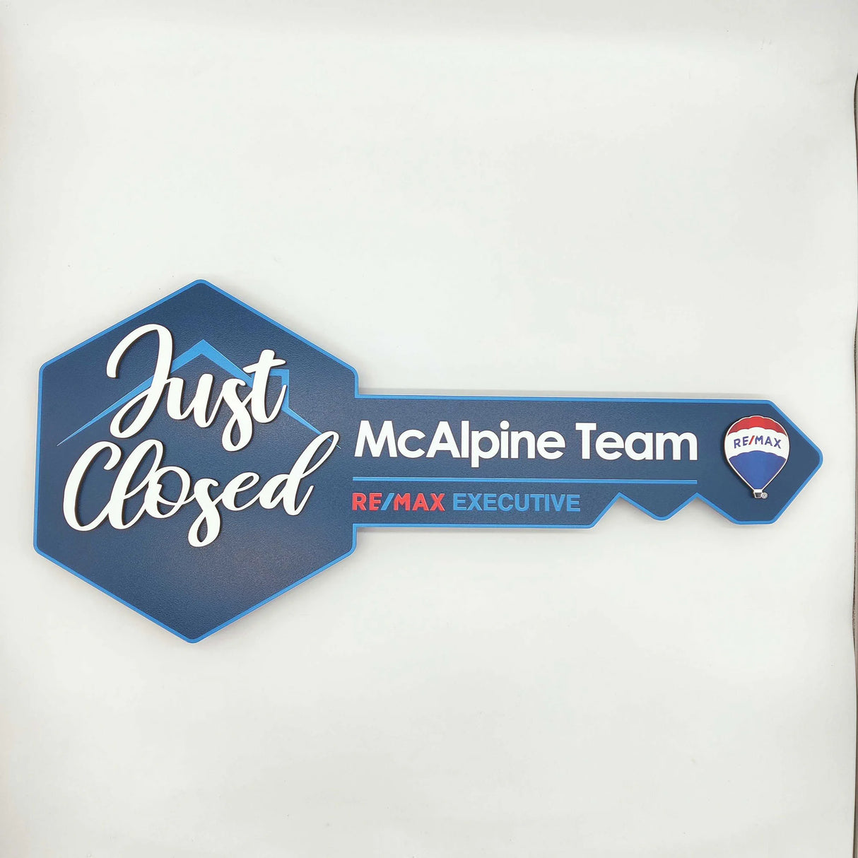 Key Shaped Sign Navy Blue and blue outline with 3D text "Just Closed"