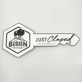 Key Shaped Sign White with Black text & outline "Just Closed"