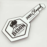 Key Shaped Sign White with Black text & outline "Just Closed"