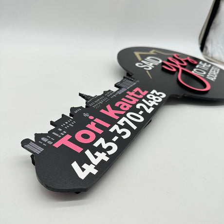 Double Sided Round Shaped Key - with a city Skyline - Real Estate Store