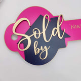 Key Shaped Pink Sold by Sign - Real Estate Store