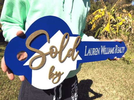 Key Shaped Prop Sign «Sold by» for Realtor - Real Estate Store