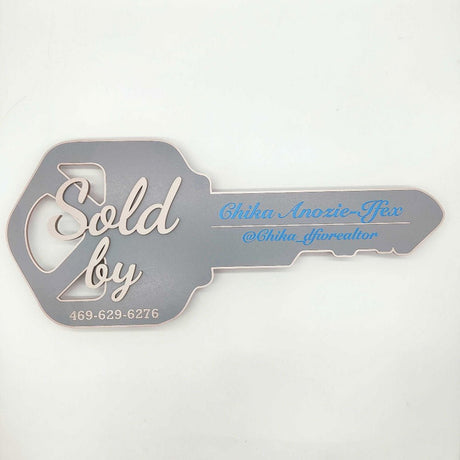 Key Shaped Sign "Sold by" - Real Estate Store