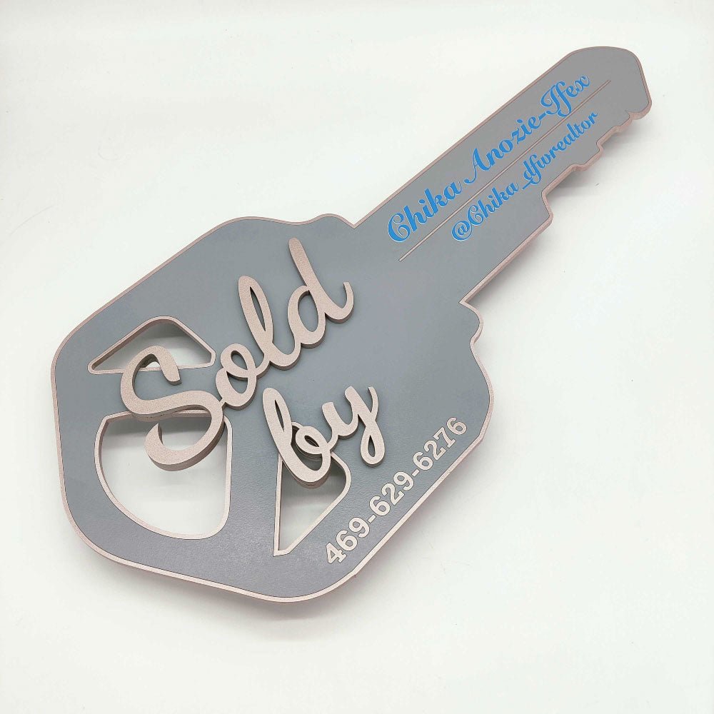 Key Shaped Sign "Sold by" - Real Estate Store