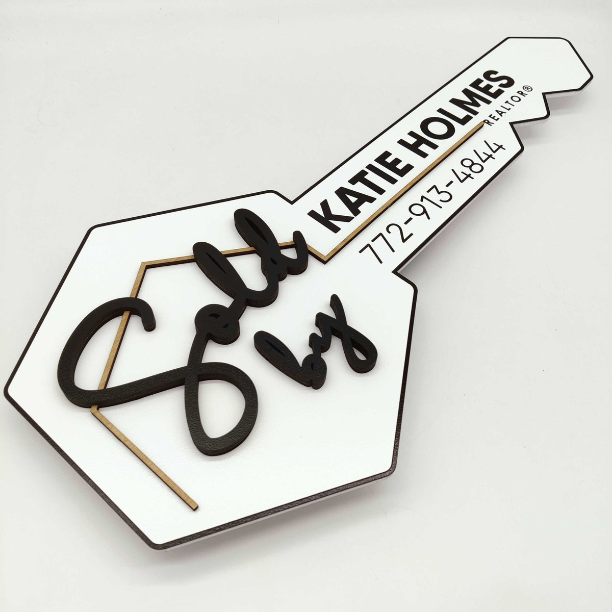 Key Shaped Sign «Sold by» – Real Estate Store