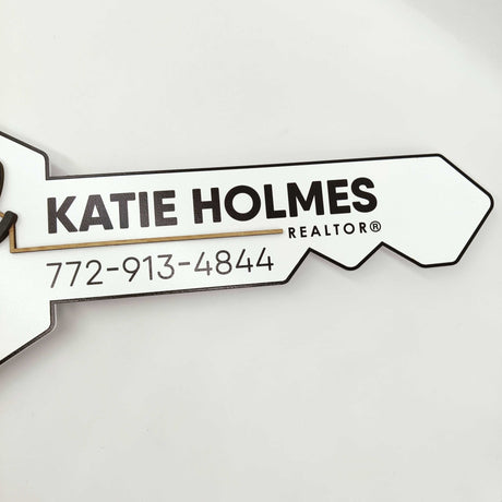 Key Shaped Sign «Sold by» - Real Estate Store