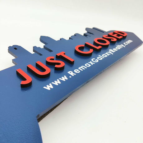 Navy Blue Round Shaped Key «Remax» - Real Estate Store