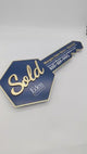 «Sold» ‎Navy Blue Hexagon Key