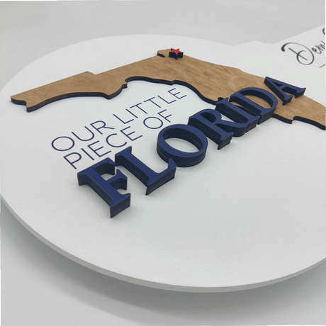 White Round Shaped Key Sign "Our Little Piece of Florida""