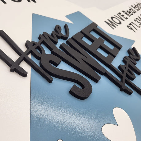 Round Shaped «Home Sweet Home»‎ Round Key Sign with a Painted House - Real Estate Store