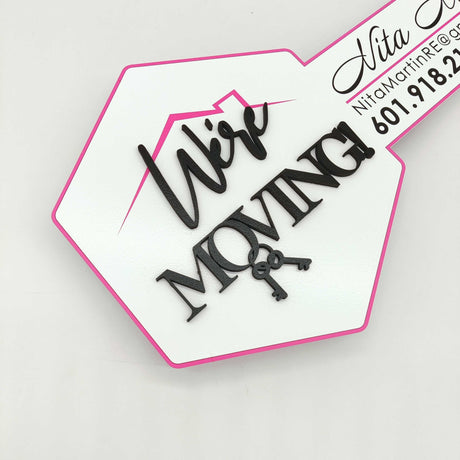 Round Shaped Key "We're moving" - Real Estate Store