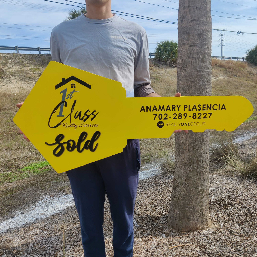 Yellow Sign For  1st Class Realty