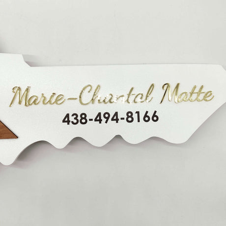 White Round Key Shaped "Vendu" - Real Estate Store