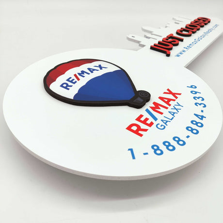 White Round Shaped Key «Remax» - Real Estate Store