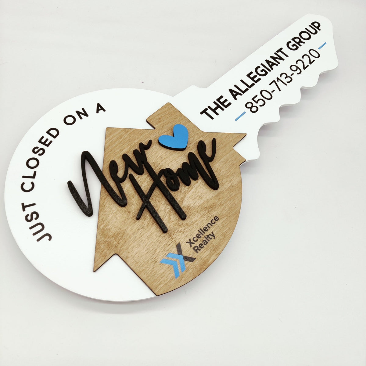 White Round Shaped Key Sign