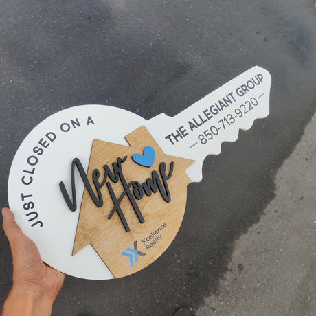White Round Shaped Key Sign «New Home»‎ - Real Estate Store